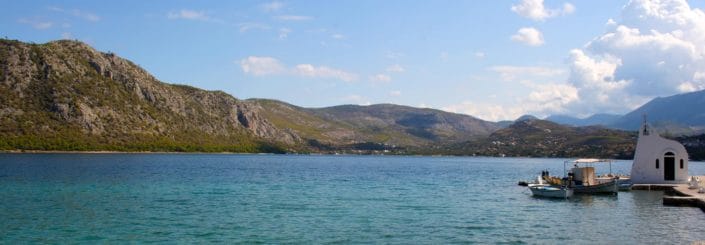 vouliagmeni lake in loutraki greece banner