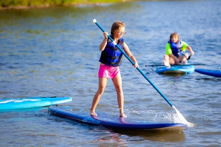 Girl paddle boarding 
