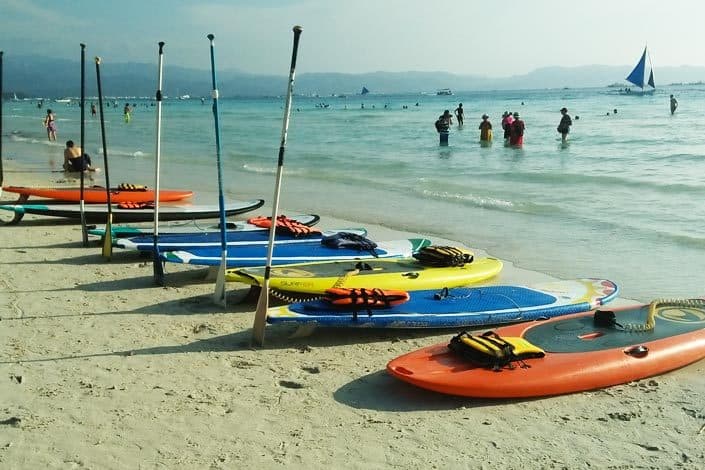 Paddle boards on a beach