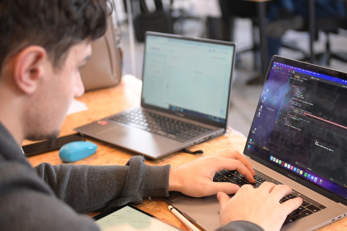 Computing and Computer Science School Trip to London - developer working on laptop